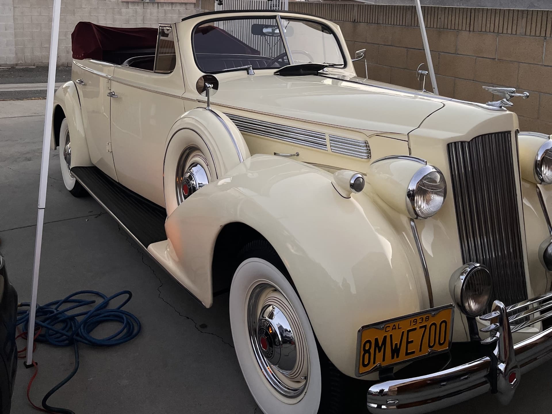 Detailed cream 1938 classic car with polished paint and chrome