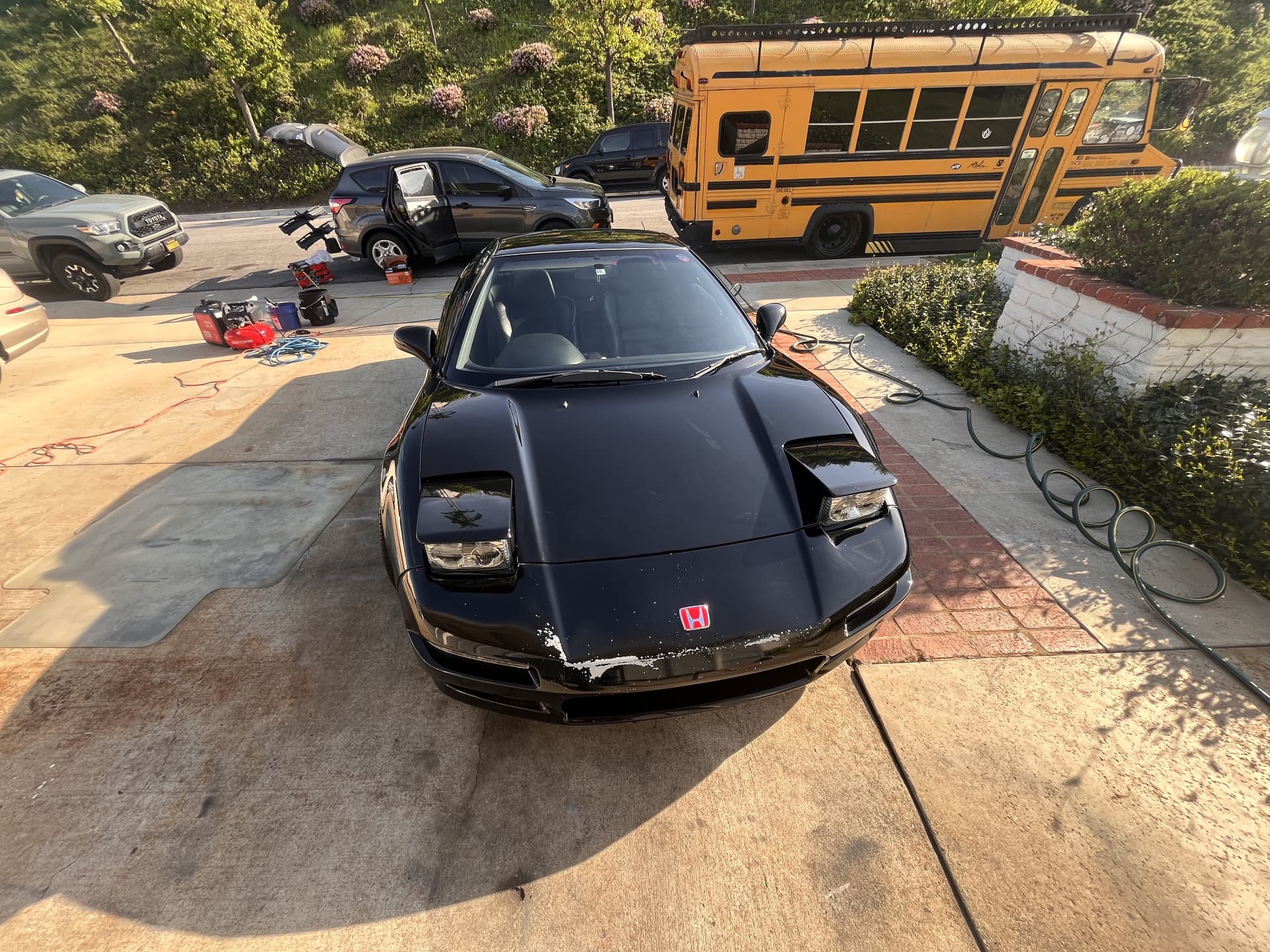 Black Honda sports car after mobile exterior detailing