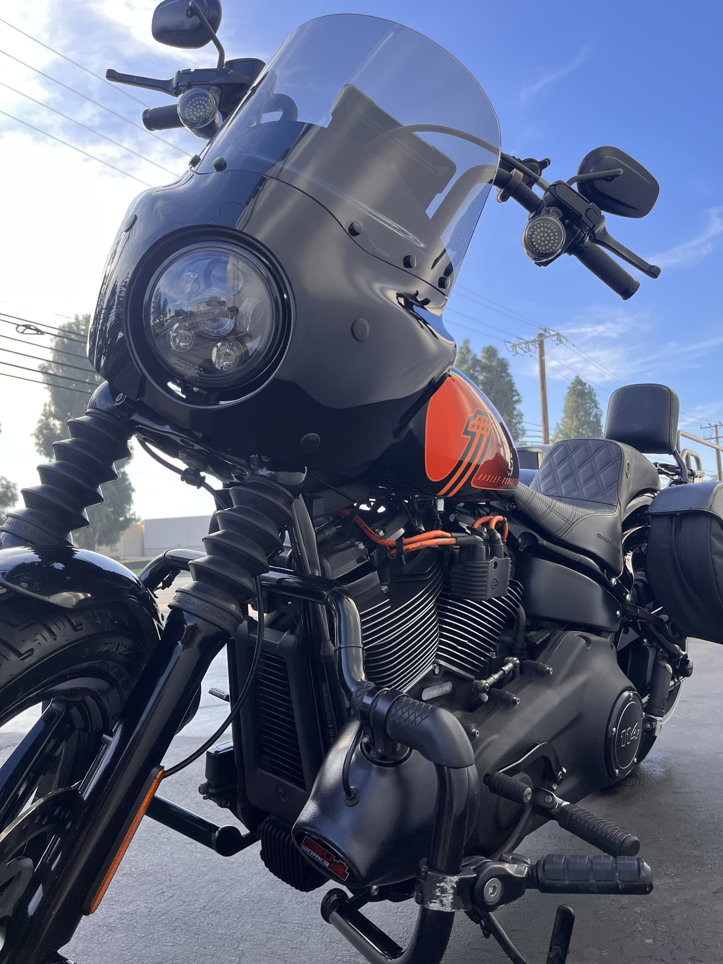 Black and orange motorcycle cleaned and polished