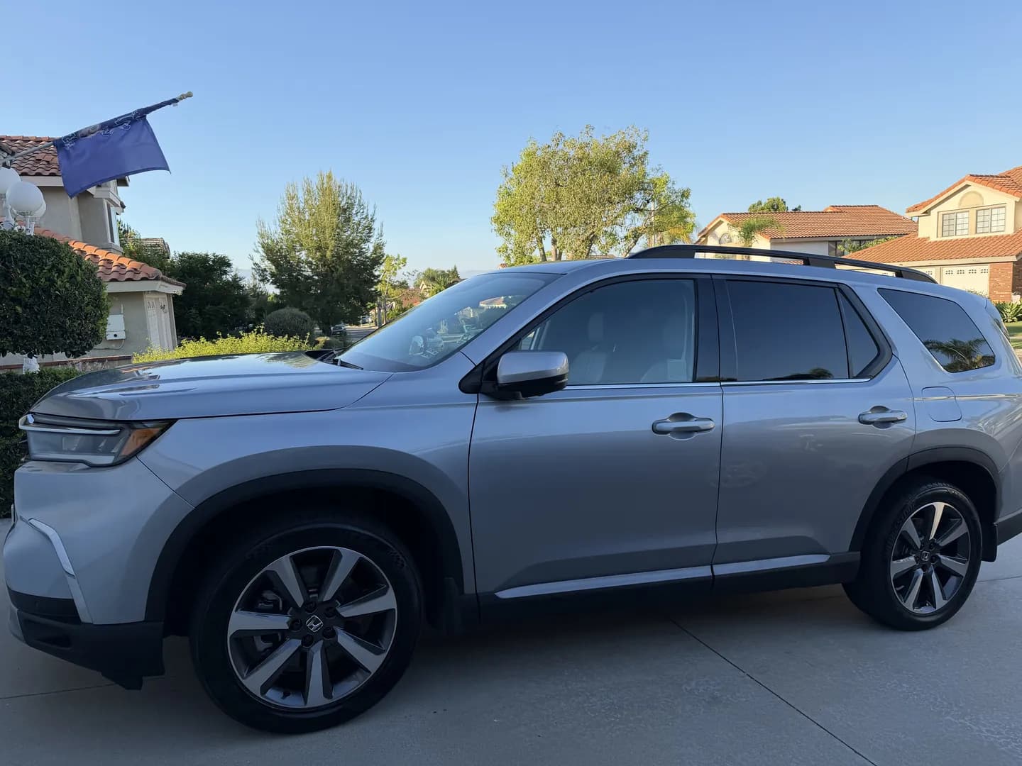 Silver SUV viewed from the side after detailing