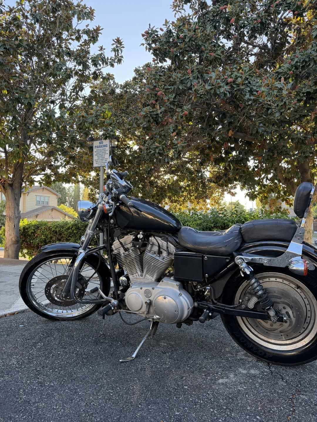 Black cruiser motorcycle with chrome engine and exhaust